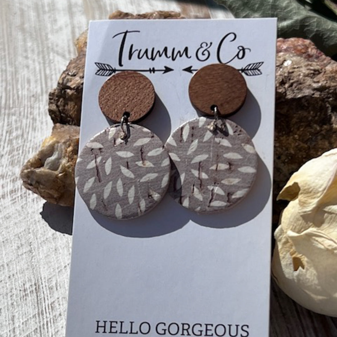 aightweight earrings, wood stud piece with cork leather ashy taupe color with ivory mum print on a Trumm & Co earring card