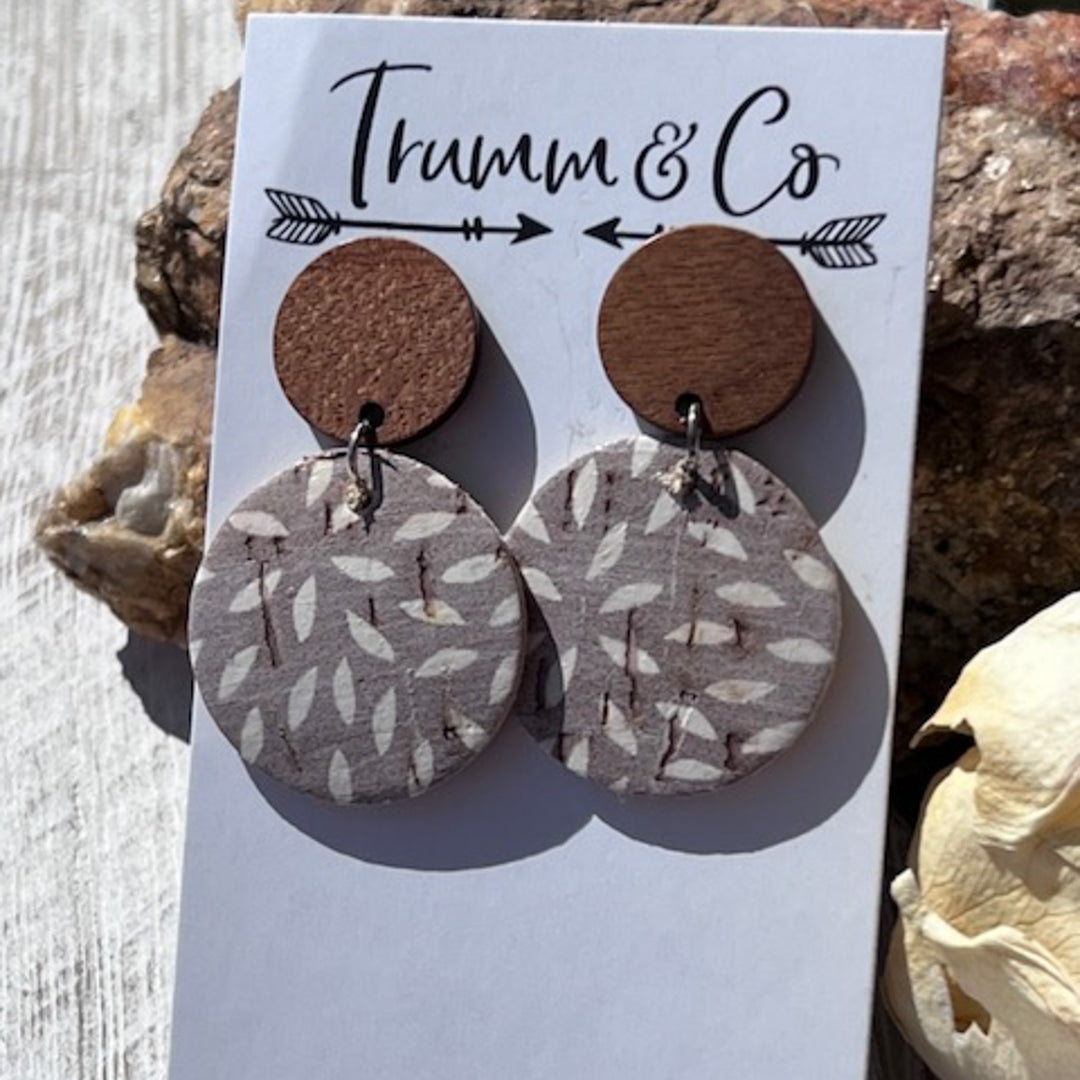 aightweight earrings, wood stud piece with cork leather ashy taupe color with ivory mum print close up 