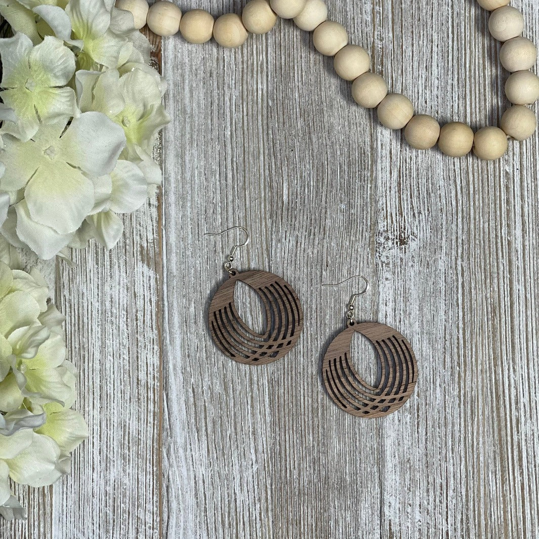 Lightweight Walnut Wooden Intricate Circle Earrings on a board