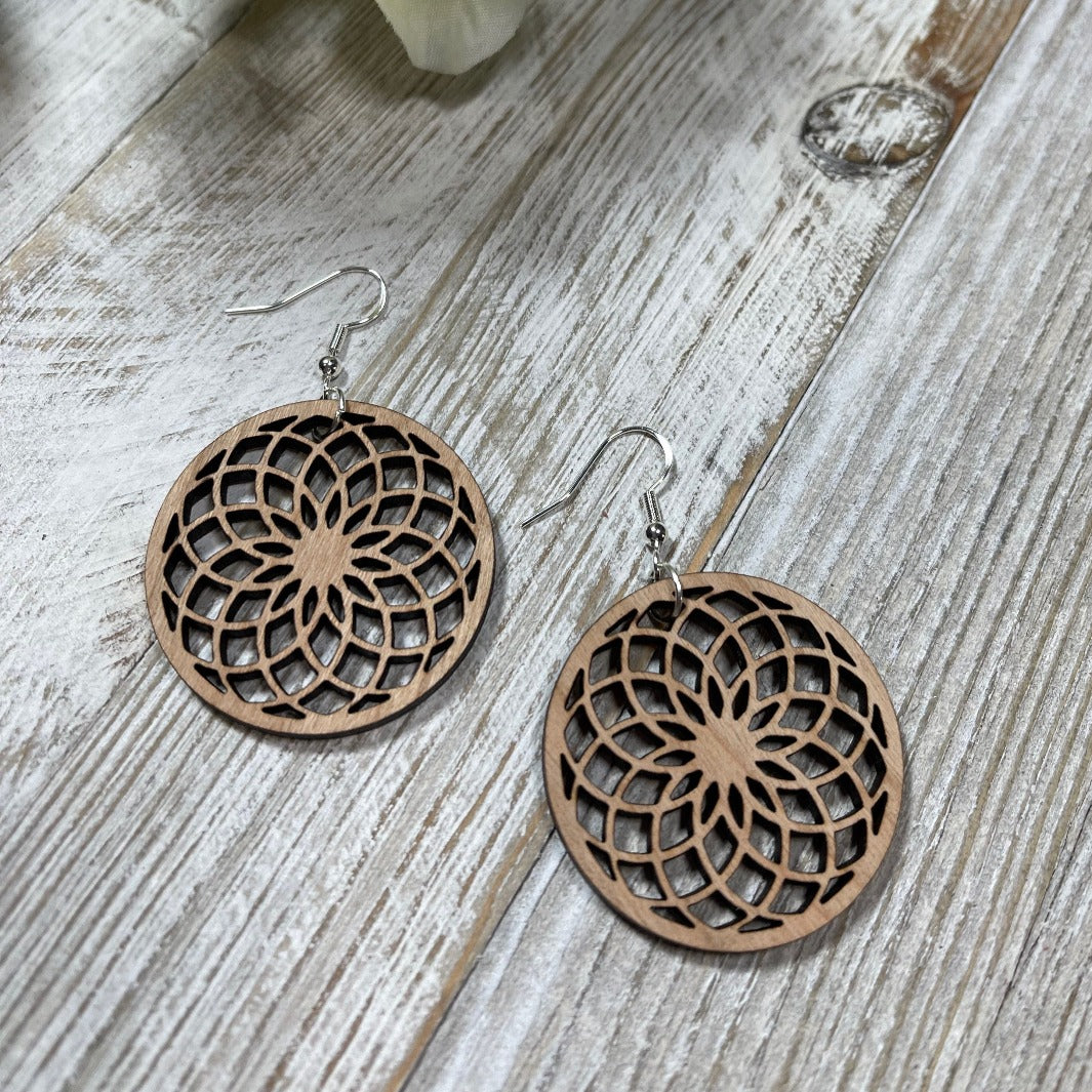 Spiral shape circle wooden dangle earrings by Trumm and Co