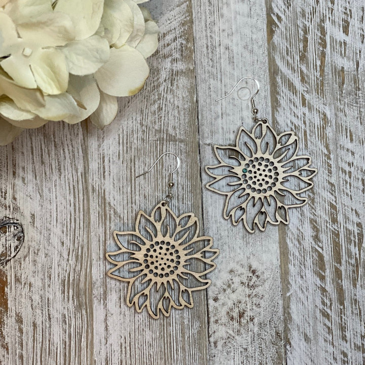 Lightweight Wood Sunflower earrings on whitewash board and flower by Trumm and Co.