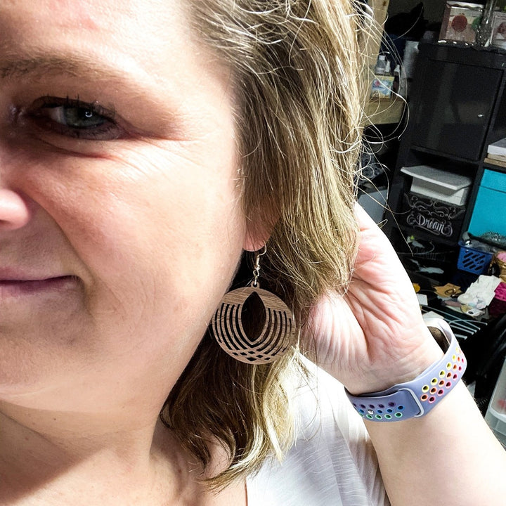 Lightweight Intricate Wooden Circle Earrings on owner of Trumm and Co